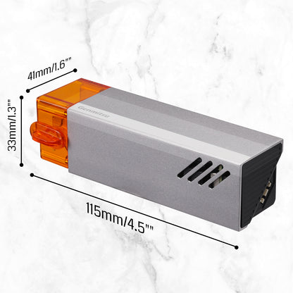 Gray electronic device with orange component and measurements on a white marble background
